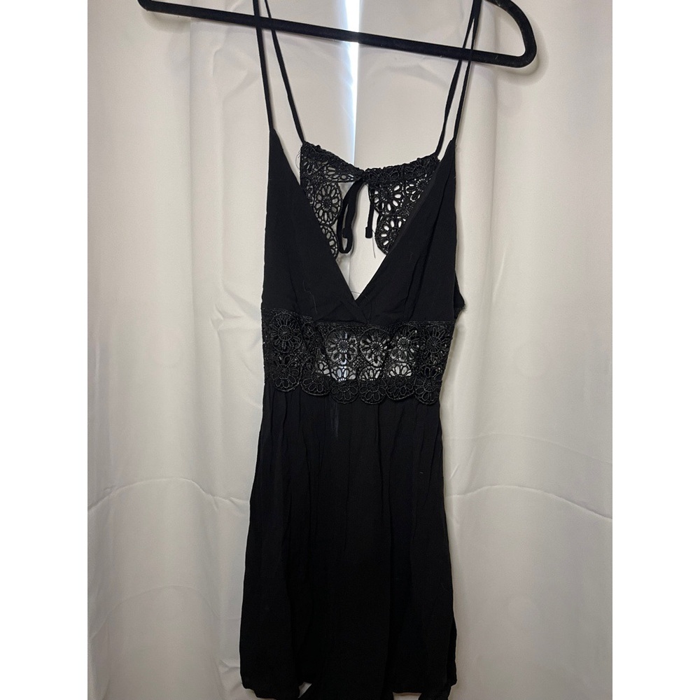 NWOT Open-Back Black Romper with Crochet Midsection and Back